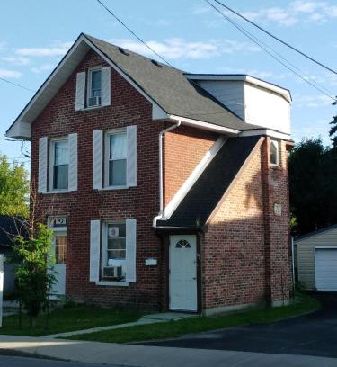 Sunnyside Apartment | Charming Downtown One Bedroom with Free Parking & Breakfast