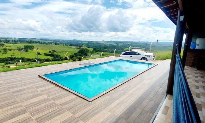 Sao Sebastiao do Paraiso House | Charming Farmhouse Retreat in Minas Gerais with Scenic Views