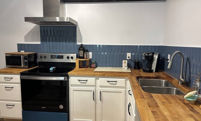 University Area Apartment | Inviting Family Retreat with Hot Tub & Pet-Friendly Amenities