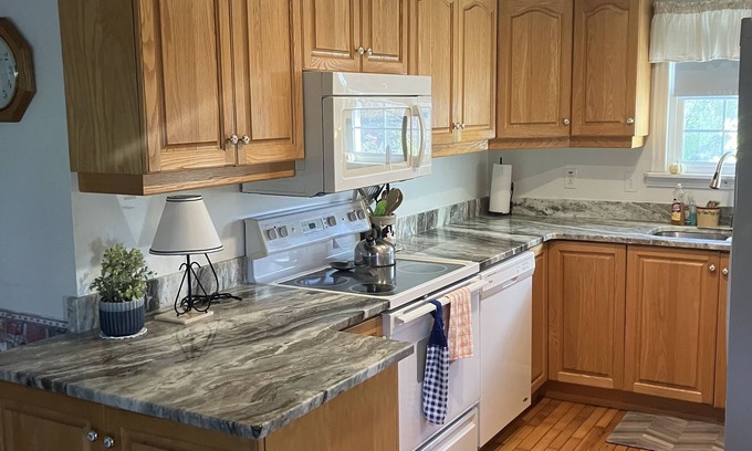 Grand Isle Other | Inviting Farmhouse Retreat with Scenic Views for Families
