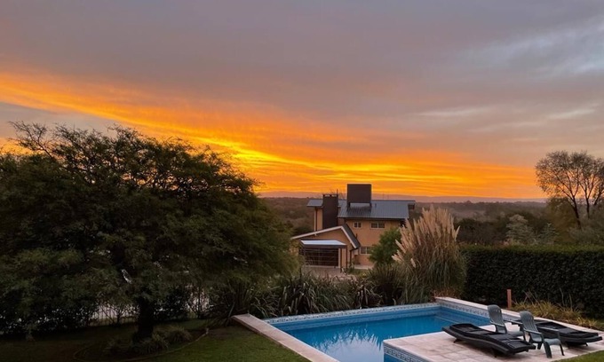 Villa General Belgrano Apartment | Inviting House with Private Pool and Scenic Champaqui Views