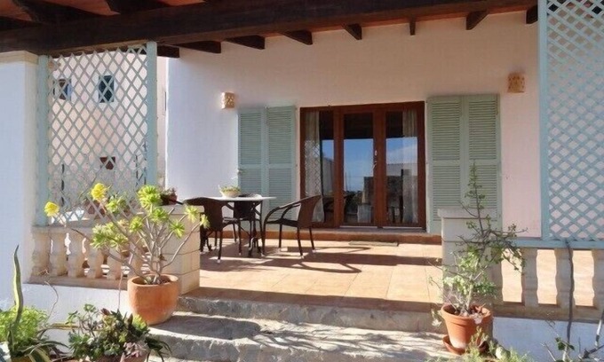 Cala Llombards Ski Chalet | Charming Holiday Home with Ocean View and Rooftop Terrace