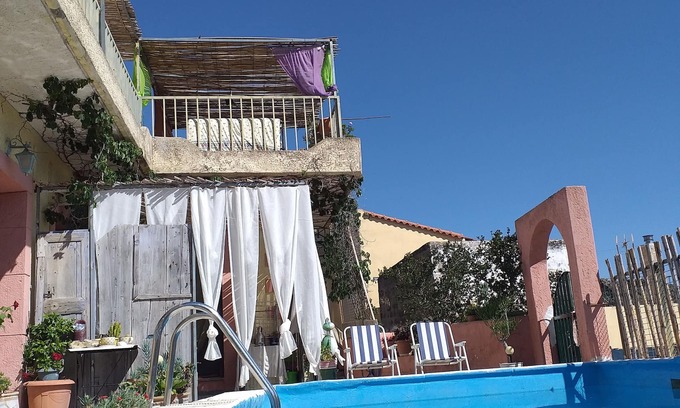 Zaros House | Inviting Getaway: Pet-Friendly with Pool & Breakfast