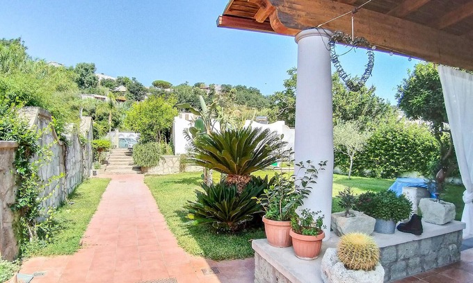 Panza House | Inviting Family Retreat with Garden and Ocean Views