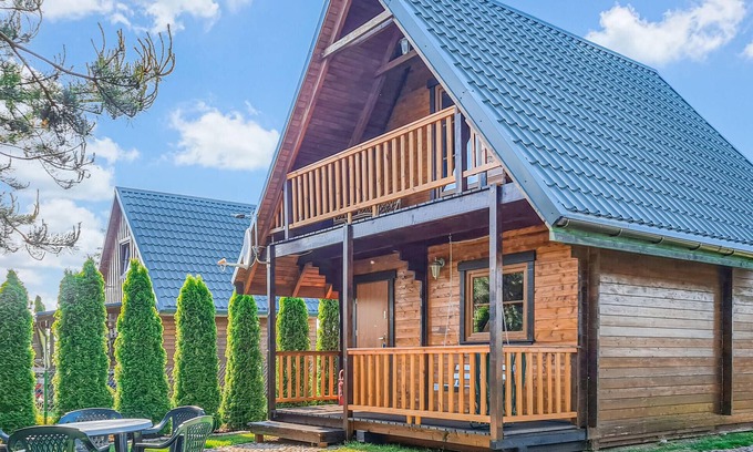 gmina Bedzino House | Serene Wooden Cottage with Lake Views in Podamirowo