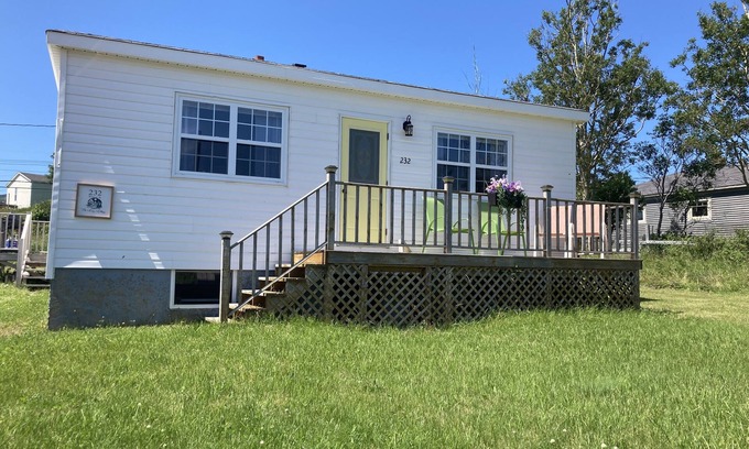 Norris Point Cottage | Charming Retreat with Breathtaking Views & Family Amenities