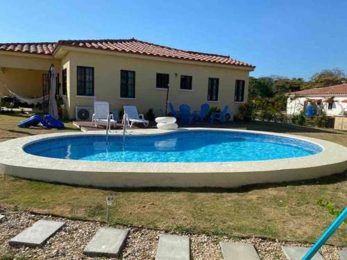 El Palmar House | Inviting Home with Pool, Near Beach in Gated Community