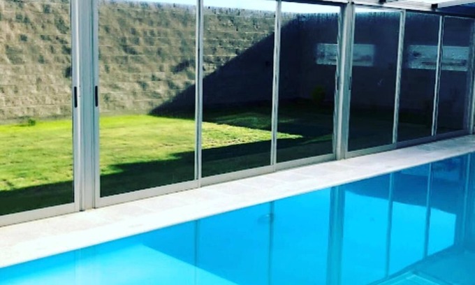 Puerto Madryn House | Inviting House with Pool, Steps from Beach and City Life