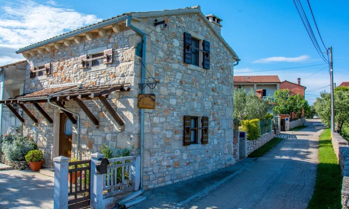 Rakalj House | Inviting Ostrich Stone House with Fireplace and Ocean View
