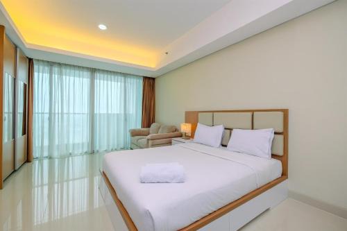 Bangka Apartment | Cozy Living and Spacious Studio at 28th Floor Kemang Village Apartment By Travelio