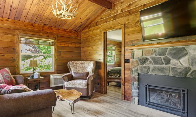 Champion Cabin | Inviting Log Cabin Retreat with Hot Tub & Spa Amenities