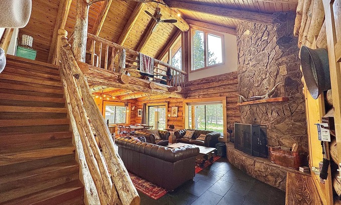 Oregon Water Wonderland Cabin | Cozy log cabin with wrap-around porch, Hot tub Loft space, Washer & Dryer