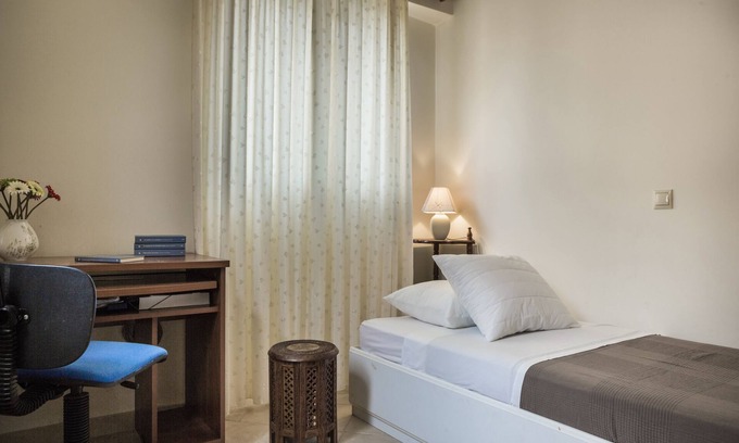 Argostoli Town Apartment | Inviting Maisonette on Palms Tree Road with Ocean View