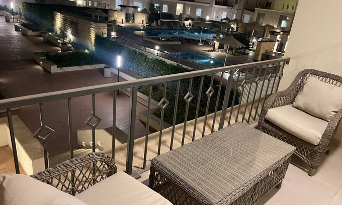 Sheraton Al Matar Apartment | Cozy Mivida Boulevard Flat Overlooking Pool