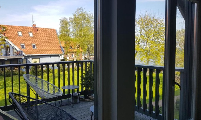Preila Apartment | Modern Apartment with Lagoon View, Pet and Child Friendly