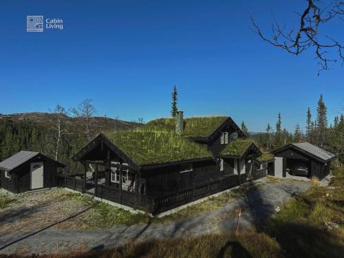 Fla Municipality House | Cozy mountain cabin with sauna, fireplace & bbq