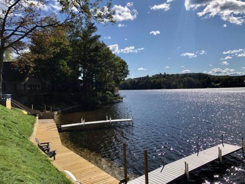 Newaygo Apartment | Cozy Pet-Friendly Cabin with Dock, Firepit, and Bikes