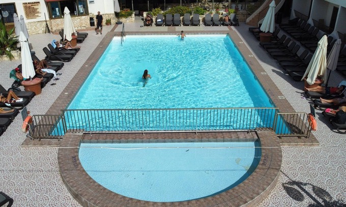 St. Paul's Bay Bed & Breakfast | Inviting Poolside Apartment with Family-Friendly Amenities