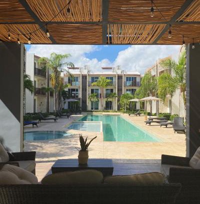 Puerto Juarez Apartment | Inviting Poolside Condo with Ocean View & Pet-Friendly Perks