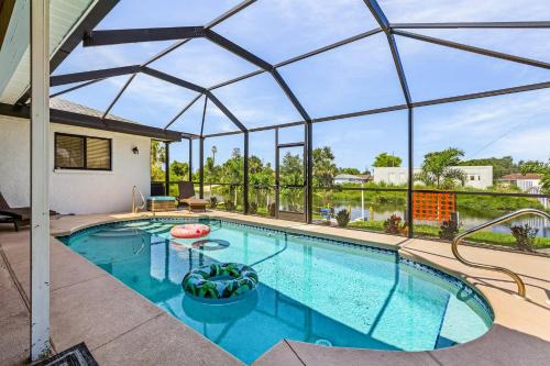 Fort Myers House | Charming 4-Star Retreat with Heated Pool & Scenic Canal