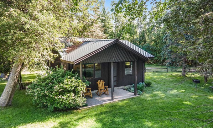 Cheboygan Cabin | Inviting Log Cabin Retreat with Ocean and Lake Views