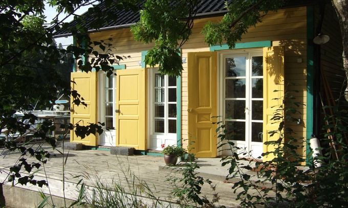 Boo Cabin | Serene Lake Cottage with Rowing Boat, Rated 9.8/10