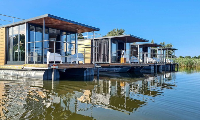 Mielno Boat Rental | Stylish Houseboat Retreat with Lake Jamno Views