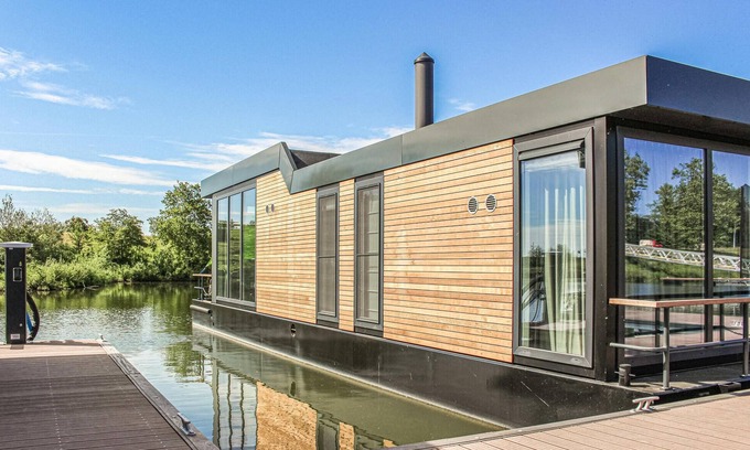 Ohe en Laak Boat Rental | Charming Houseboat Retreat with Lake View in Limburg Raum