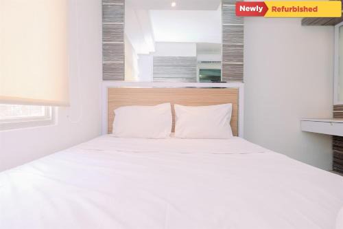 Pluit Apartment | Cozy 2BR Green Bay Pluit Apartment for Your Ideal Getaway
