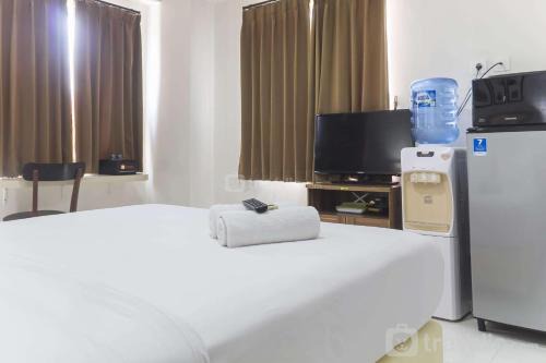 Cikarang Apartment | Inviting Studio at Elvis Tower Apartment by Travelio