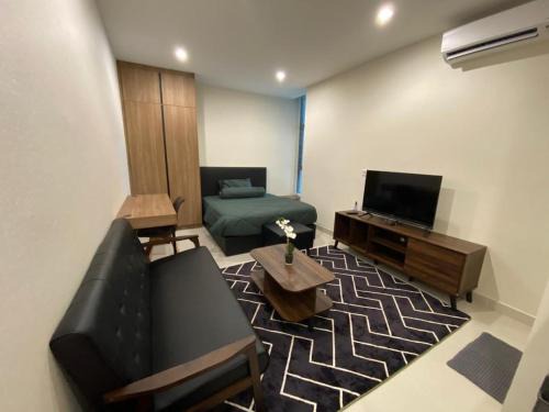 Batu Lintang Apartment | Inviting Studio at Kozi Square with Oceanfront Views