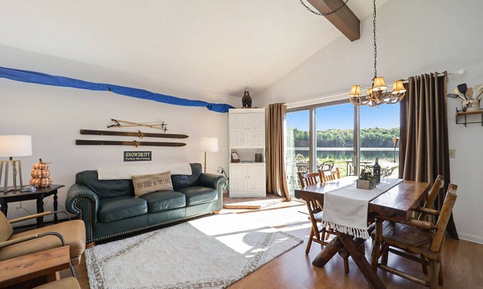 Gaylord Condo | Tranquil Lakefront Cabin with Patio, Beach & Pet-Friendly Amenities