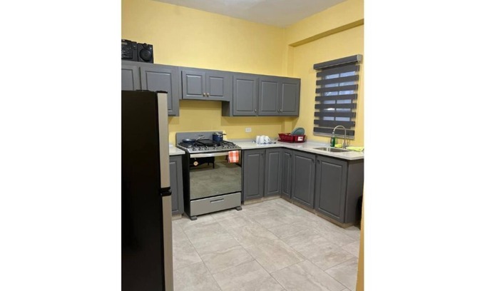 Claxton Bay Apartment | Inviting Two-Bedroom Townhouse with Family-Friendly Amenities