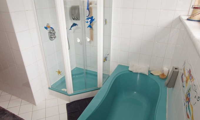 Gaming Apartment | Cozy Vacation Apartment with Balcony and Family-Friendly Kitchen