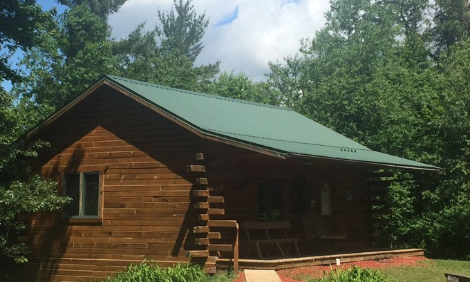 Black River Falls Cabin | Cozy Creekside Amish Log Cabin with Pool & Spa Amenities