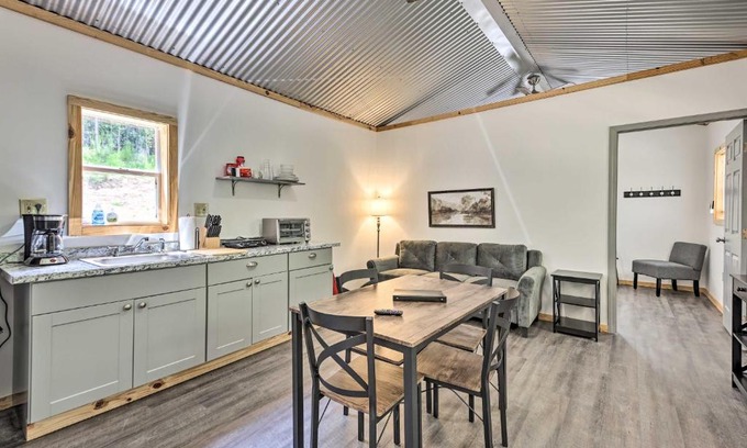East Tallassee House | Pet-Friendly Creekside Cabin Retreat with Fire Pit Access