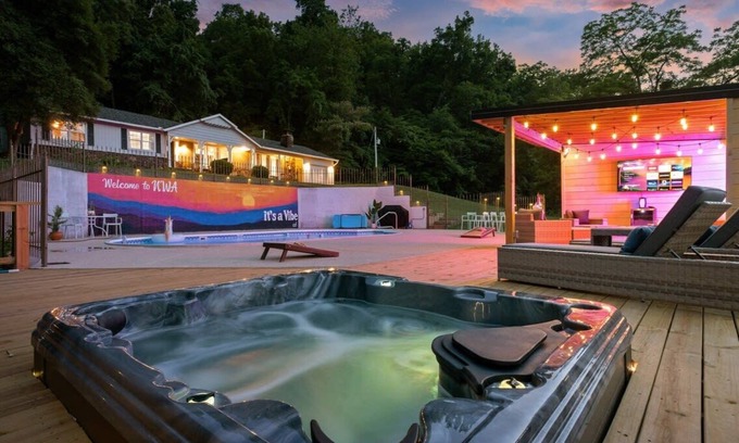 Rogers Cottage | Creekside Oasis: Family Adventure Awaits in Rogers