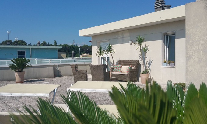 Misano Adriatico Apartment | Cozy Attic with Roof Garden and Ocean Views by the Beach