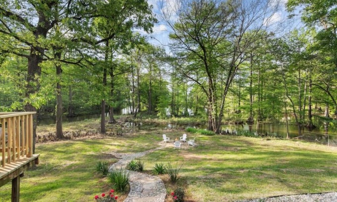 Shreveport House | Elegant Cross Lake Cove: Pet-Friendly Retreat with Spa