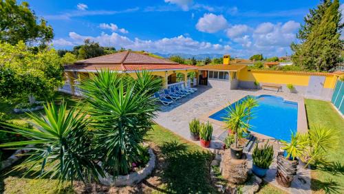 Alhaurin de la Torre House | Experience Cubo's Finca Megan: Family-Friendly with Pool
