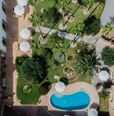 Maria de la Salut Hotel | Discover Curolla Petit Hotel: 4-Star Retreat with Pool