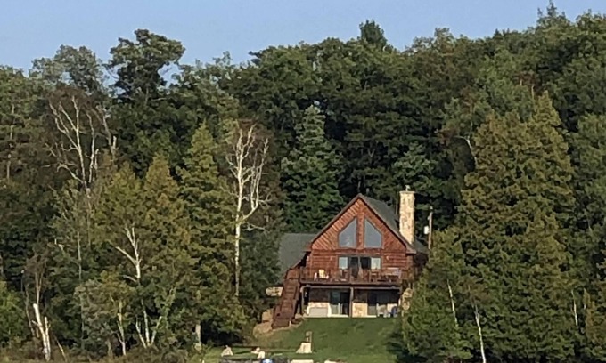 Skidway Lake Cabin | Lakefront Custom Log Home in Northern Michigan - Pet Friendly
