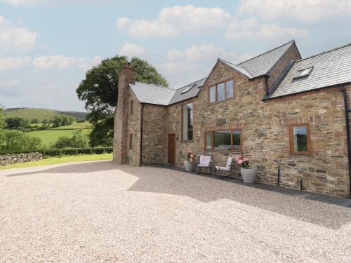 Pennant Melangell House | Family-Friendly Cwmwr: A 4-Star Retreat Awaits You