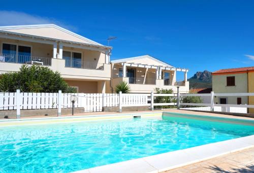 Viddalba Apartment | Relax at Dòmo#31 - Poolside Villa with Ocean Views