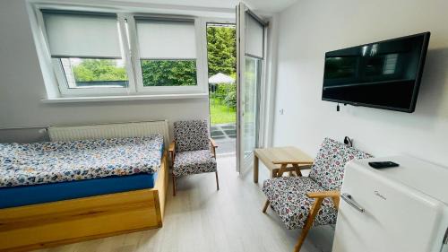 Charzykowy House | Exceptional Stay at Długa 100: Pet Friendly & Family Ready
