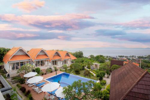 Sampalan House | Oceanfront D'Arya Sea View: Top-Rated Family Getaway