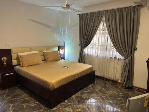 Kumasi House | Prime Location at D Barfi Guesthouse with Family-Friendly Vibes