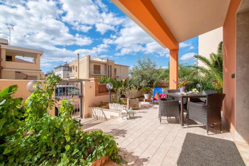 Alghero Apartment | Experience Family-Friendly Comfort at Dada House