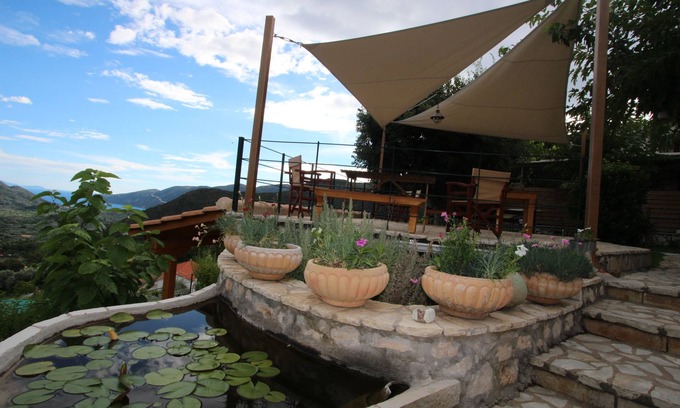 Sivros Cottage | Explore DAFNI: A Scenic Two-Level Stone Retreat