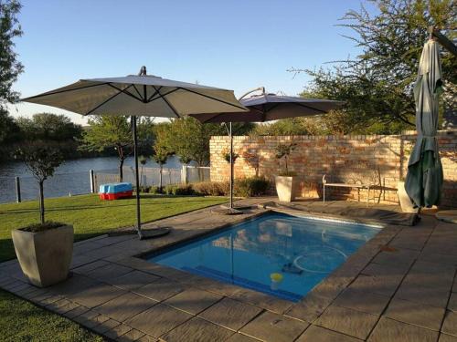 Parys House | Discover Dam'n Devine: Family-Friendly with Pool Access
